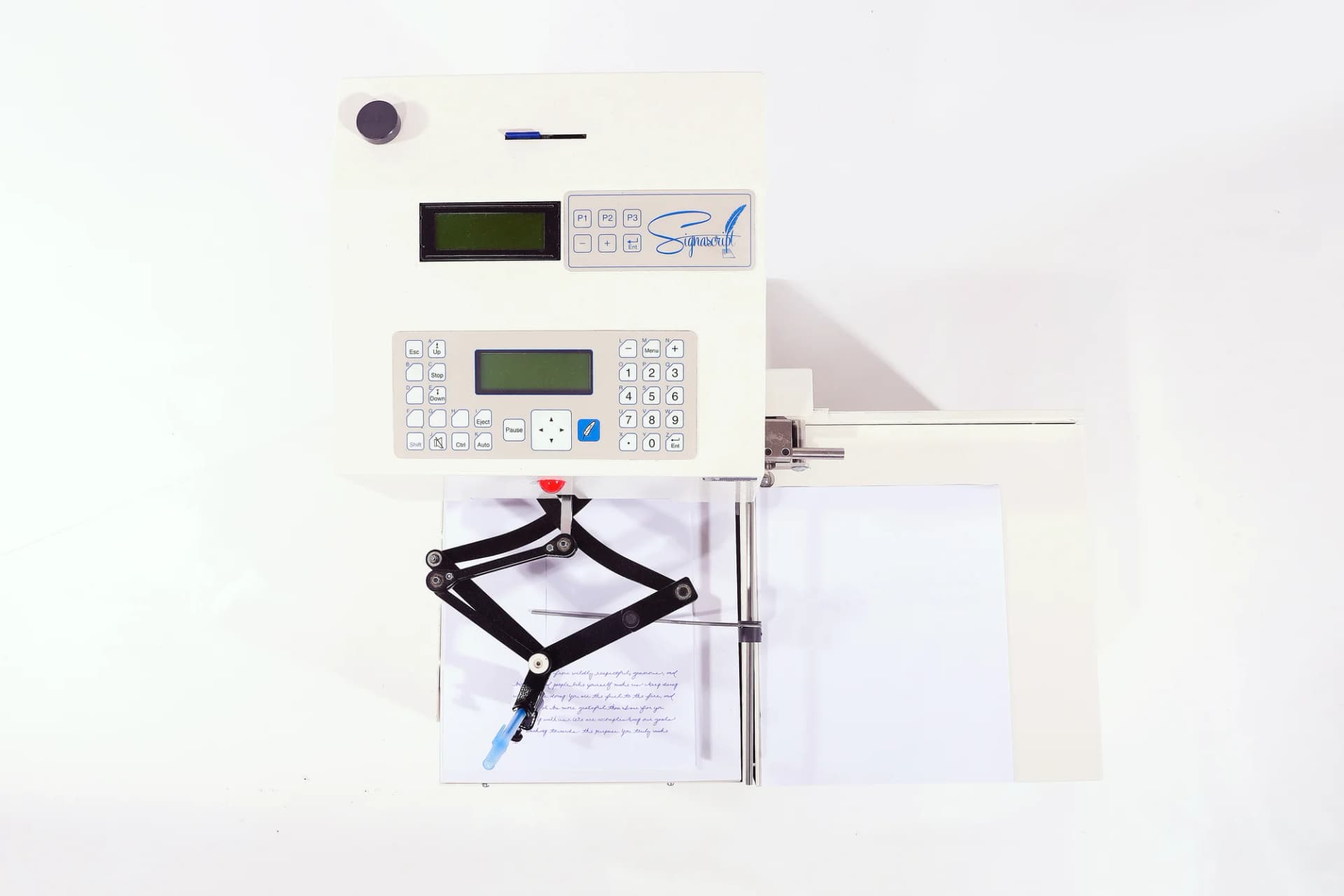 Top-down view of an Autopen machine writing a handwritten letter
